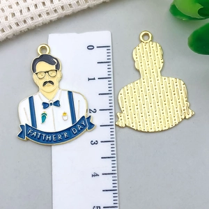 Detail of colorful Father's Day alloy pendants with ruler showing 3.5cm height