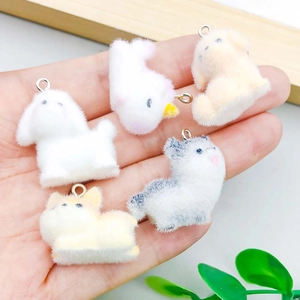 Set of five colorful flocked animal charms including puppies and unicorns for DIY jewelry