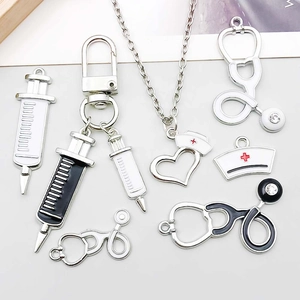Detailed collection of medical-themed charms with stethoscope and syringe designs