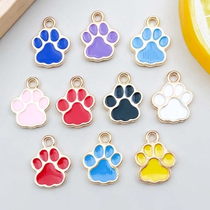 Detailed set of ten colorful enamel paw pendants for DIY jewelry making and crafts
