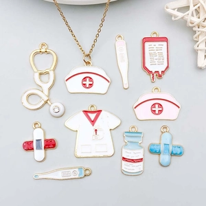 Macro detail of colorful medical charms featuring stethoscopes and thermometers