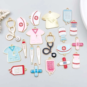 Assorted colorful enamel medical charms including stethoscopes and thermometers for DIY jewelry