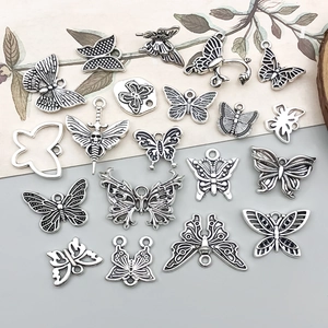 Vintage silver hollow butterfly charms for DIY jewelry making pendants and necklaces