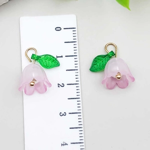 Detailed view of lily of the valley pendant size measured by ruler in 2.5cm height