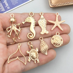 Lot de 8 pendentifs animaux marins dorés dont poulpe et hippocampe pour bijoux DIY