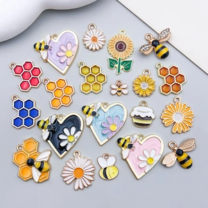 Colorful enamel bee and honey flower charms set for DIY jewelry making and crafts