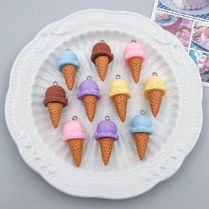 Detailed view of colorful resin ice cream cone charms for DIY jewelry and crafts