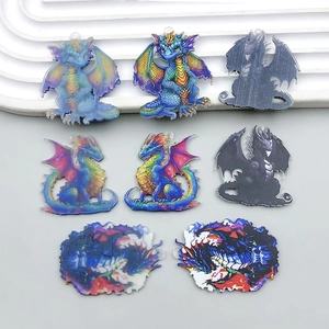 Macro detail of mixed colorful acrylic double-sided dragon charms for DIY jewelry making