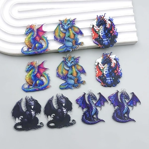 Detail view of 10 colorful double-sided acrylic dragon charms with precise laser-cut edges