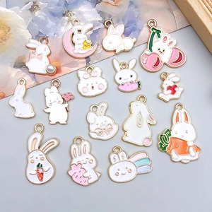 Detailed close-up of colorful cartoon rabbit alloy charms for DIY jewelry making
