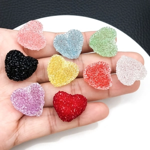 Colorful matte heart pendants in various acrylic resin shades for DIY jewelry making