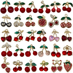 Assorted red cherry and fruit charms with rhinestones for DIY jewelry making