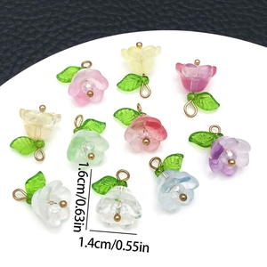Macro shot of 1.6cm colorful frosted lily of the valley pendants with gold metal loops
