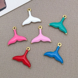 Set of six colorful enamel mermaid tail pendants with golden metal edges in various vibrant tones
