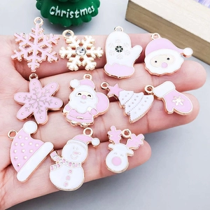 Pink and rose gold Christmas alloy pendants with snowflake and Santa motifs
