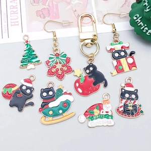 Mix of 20 Christmas enamel charms featuring Santa cats, trees, and snowflake pendants