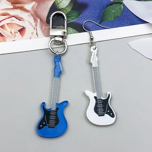 Detail view of colorful acrylic guitar pendants for DIY jewelry and keychains
