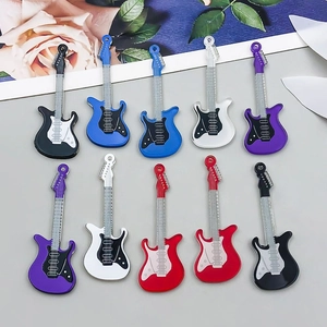 Detailed view of colorful acrylic guitar charms for DIY necklaces and bracelets making