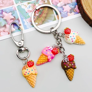 Macro shot of colorful resin ice cream cone charms for DIY jewelry and keychains