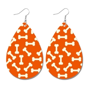 Halloween traanvormige oorbellen van oranje kunstleer met witte botten patronen