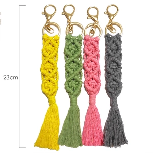 Set of 4 handmade bohemian tassel keychains in various colors with gold lobster clasps