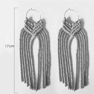Detail view of 17cm handmade woven tassel earrings showing length and boho style