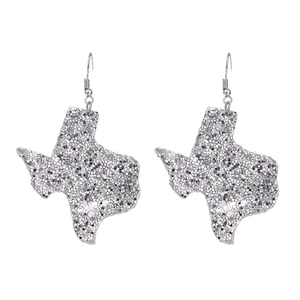 Glittery silver Texas map shaped leather drop earrings on a clean white background