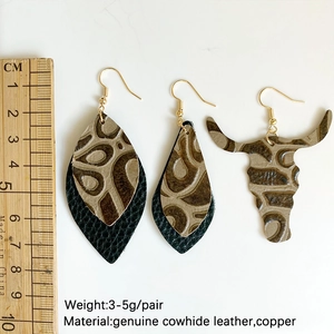 Boucles d'oreilles vintage en cuir véritable en forme de feuille et tête de taureau marron