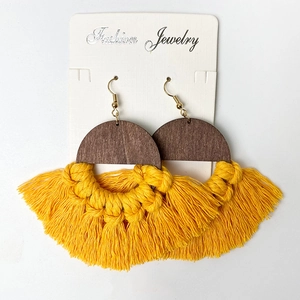 Bohemian handmade tassel earrings with brown wood and yellow woven cotton fringe
