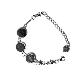 Silver bracelet with black marble stones, star charms and heart made with love tag