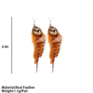 Bohemian natural feather earrings in orange and white with 6.3 inch length