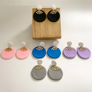 Handmade geometric clay earrings set in five colors with golden metallic fan details