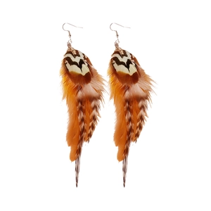 Bohemian long orange feather earrings with tribal patterns on a clean white backdrop