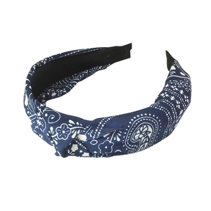 Navy blue paisley print headband with a stylish top knot design for women