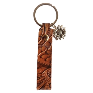Vintage sunflower leather keychain with embossed pattern and bronze ring pendant