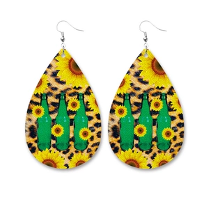 Teardrop earrings with leopard print, sunflowers and green beer bottles on white background