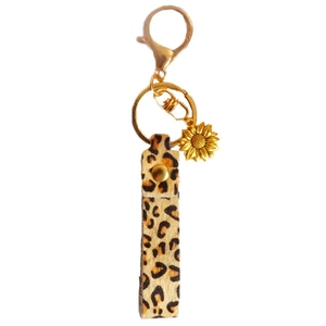Leopard print leather keychain with golden sunflower pendant and clasp for bags