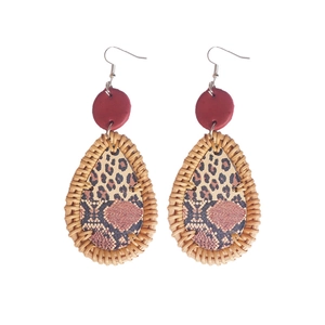 Bohemian drop earrings with red studs, leopard print centers, and woven rattan frames