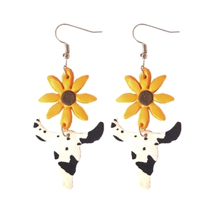 Sunflower and cow print cattle skull clay drop earrings for a trendy western style