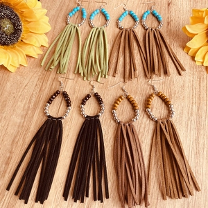 Bohemian fringe earrings set with turquoise beads and suede tassels in four earth tones