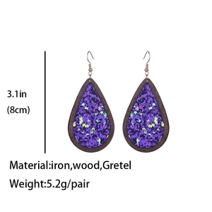 Detailed view of teardrop wood earrings with purple glitter and iron hook dimensions