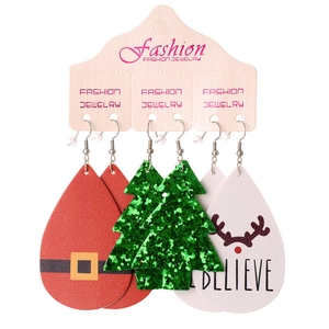 Set di orecchini natalizi in pelle con Babbo Natale, alberi e scritte Believe