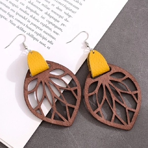 Bohemian leaf-shaped hollow wood and yellow leather earrings with vintage metal hooks