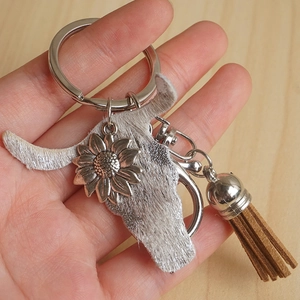 Handmade western bull head keychain with silver sunflower detail and long leather tassel