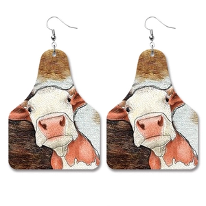 Western faux leather teardrop earrings featuring watercolor cow print and ear tag shape