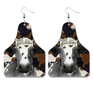 Cow print leather earrings in ear-tag shape with rustic western country farmhouse style