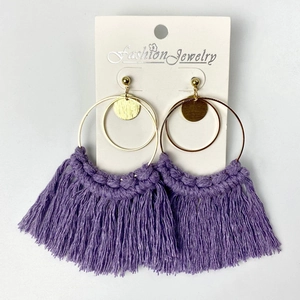 Handmade purple tassel earrings with golden geometric circles and fan-shaped fringe