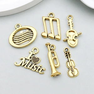 Détails de breloques musicales en or antique avec guitare et violon pour bijoux DIY