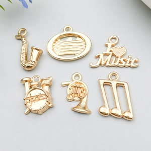 Lot de breloques dorées sur le thème musique pour création de bijoux DIY et colliers