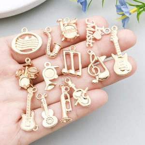 Ensemble de pendentifs instruments de musique dorés pour création bijoux DIY